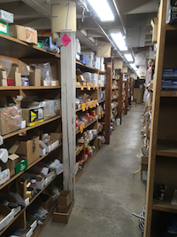 Our warehouse shelves, with thousands of parts in stock.